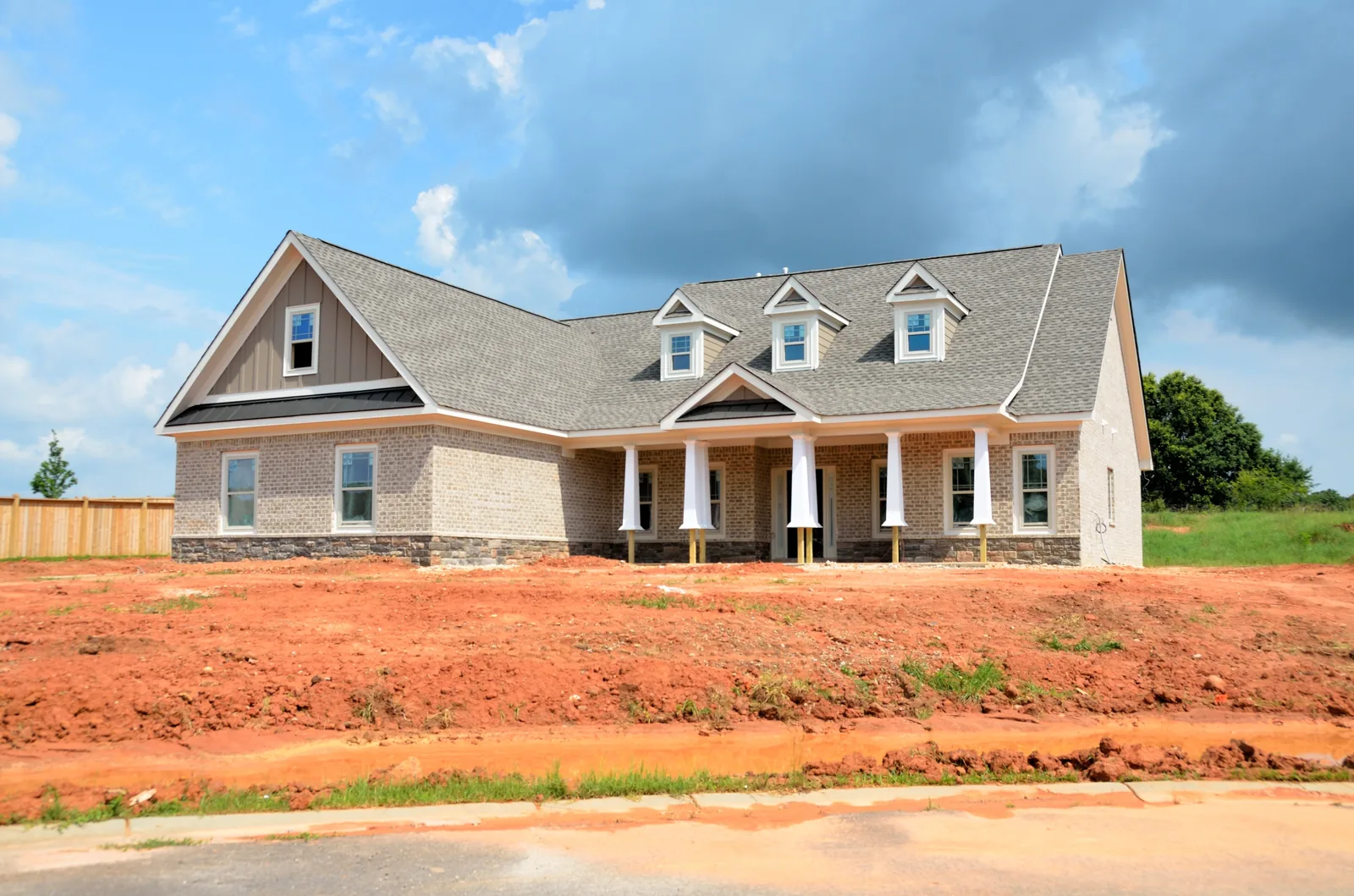 Newly-installed architectural asphalt shingle roof on a Colorado Springs home by Total Roofing